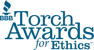BBB Torch Awards for Ethics logo, symbolizing recognition for ethical business practices, relevant to Sorensen Roofing & Restoration's commitment to professional service and trust in hail damage inspections.